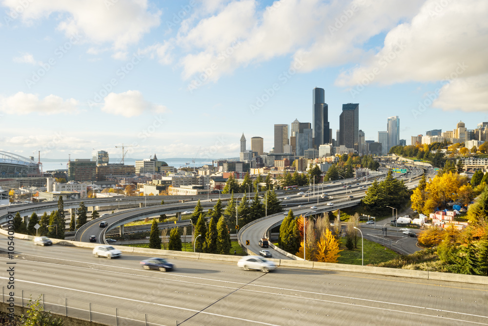 traffic on cityroad through modern buildings