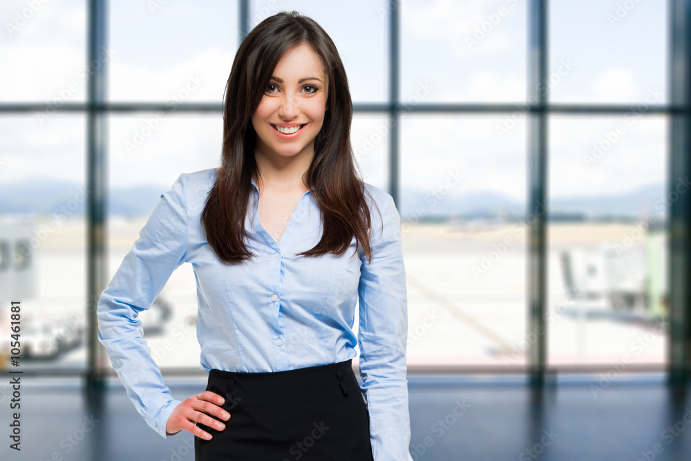      Smiling young female manager portrait