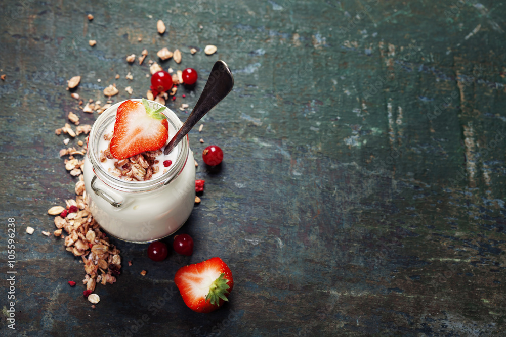 Healthy breakfast of muesli, berries with yogurt and seeds