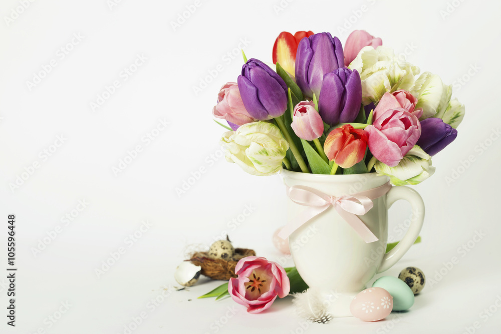 Beautiful tulips bouquet and easter eggs