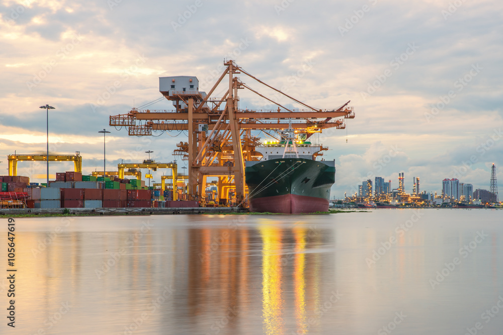 Industrial Container Cargo freight ship with working crane in sh