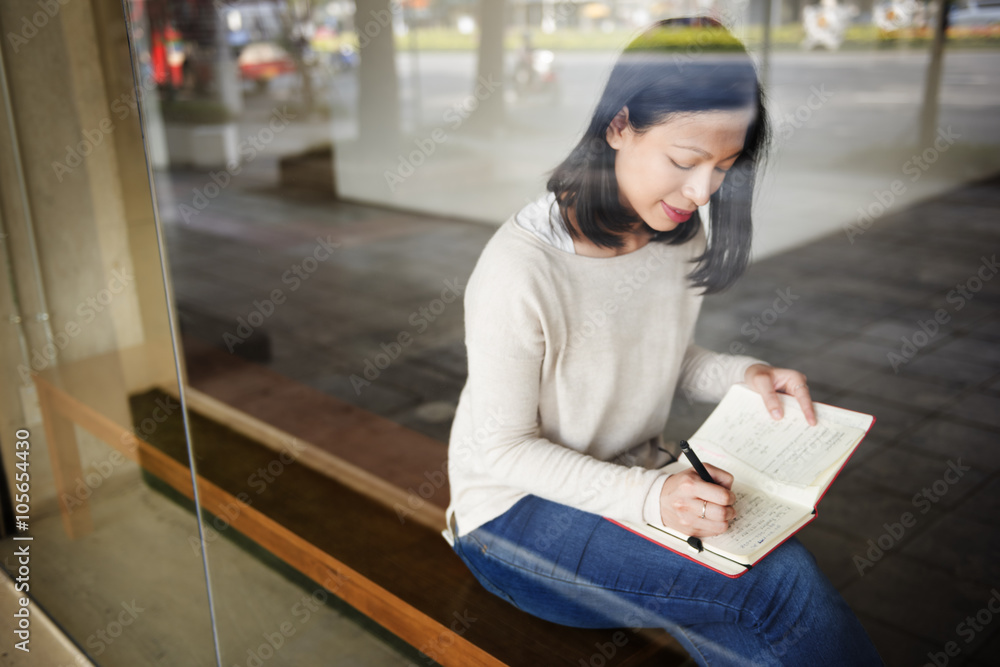 Asian Lady Writing Notebook Diary Concept