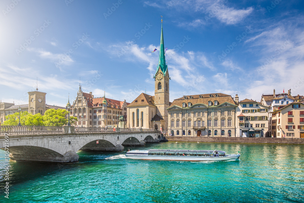 Zürich city center with boat on river Limmat, Switzerland