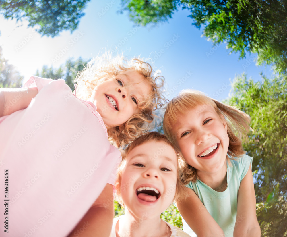 Children playing outdoors in spring park