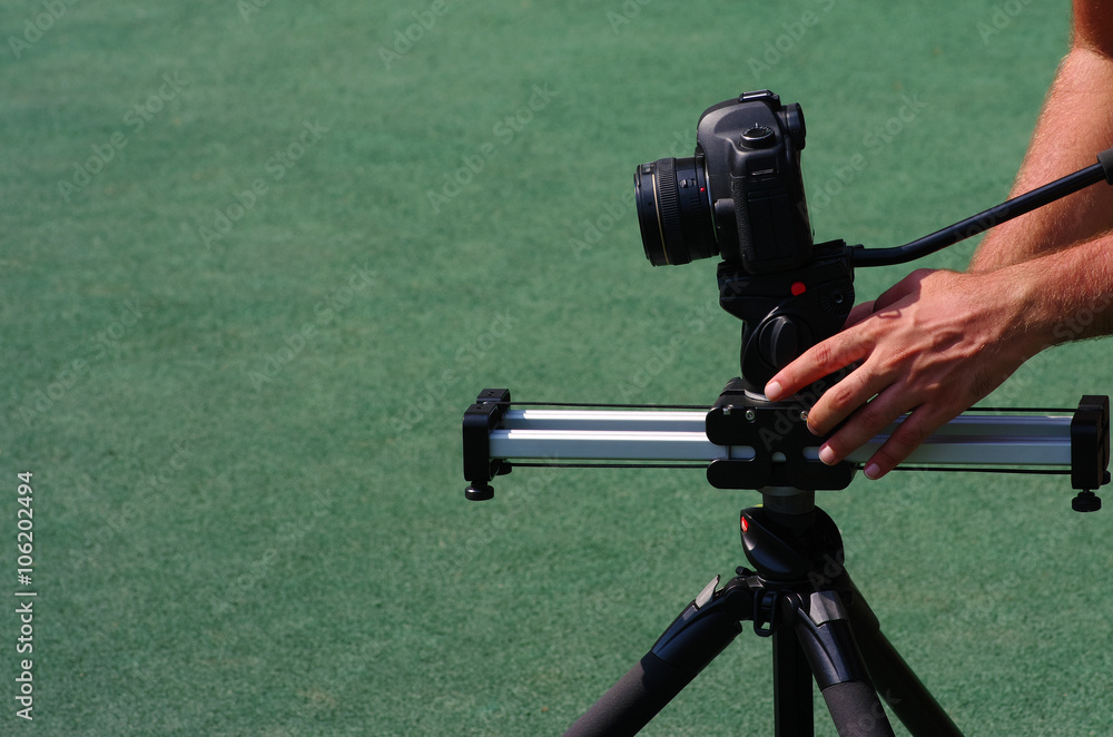 hand of man with a camera