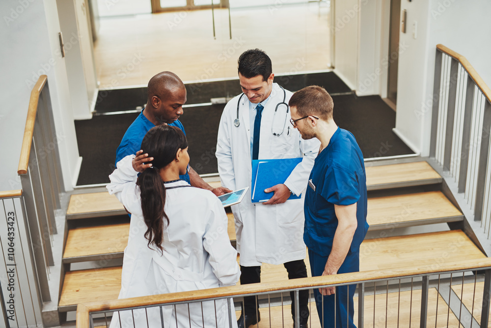 Confident team of doctors talking