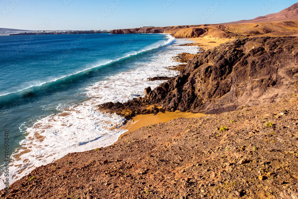 Papagayo beach near Las Coloradas resort on the south of Lanzarote island in Spain