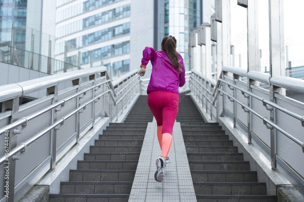 Women are up the stairs running