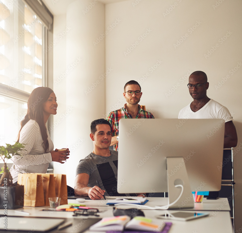 Group of young adults at small business