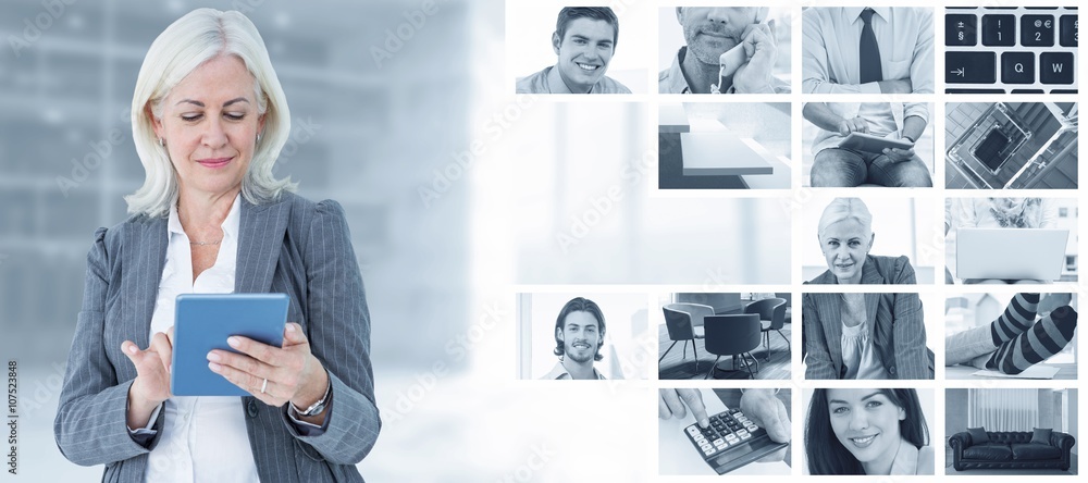 Composite image of confident businesswoman using digital tablet