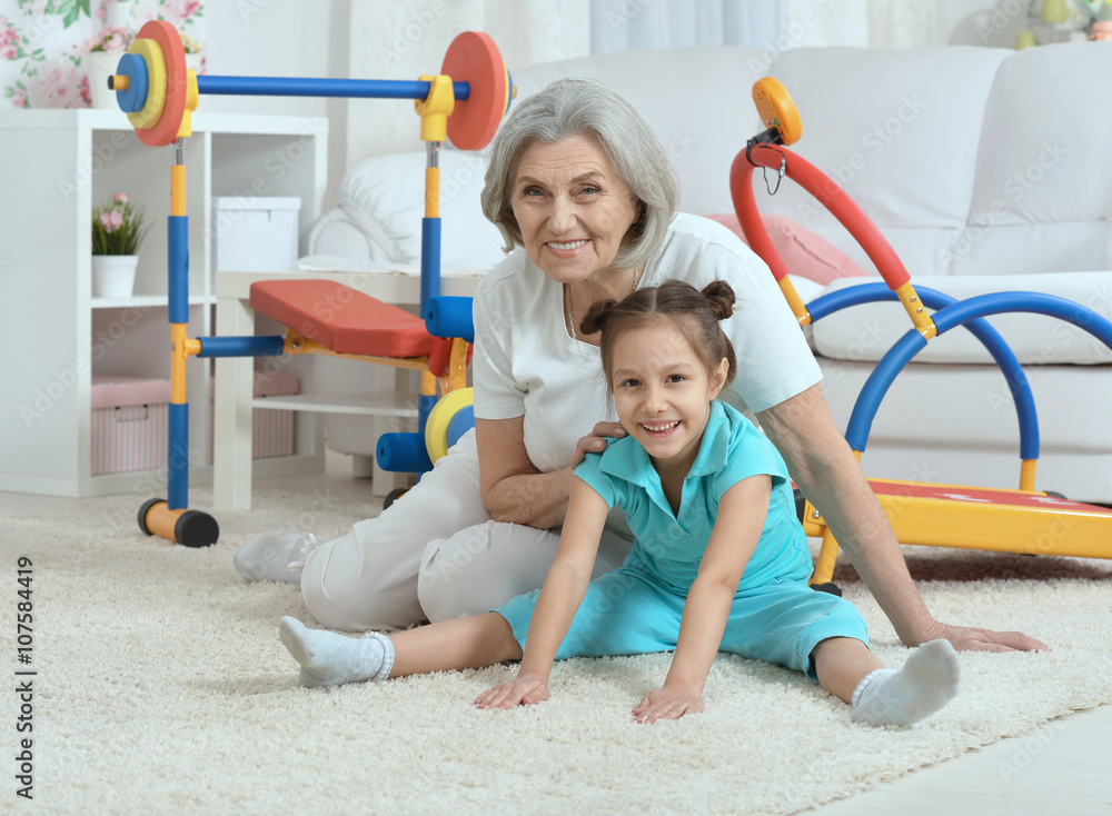 little granddaughter doing exercise