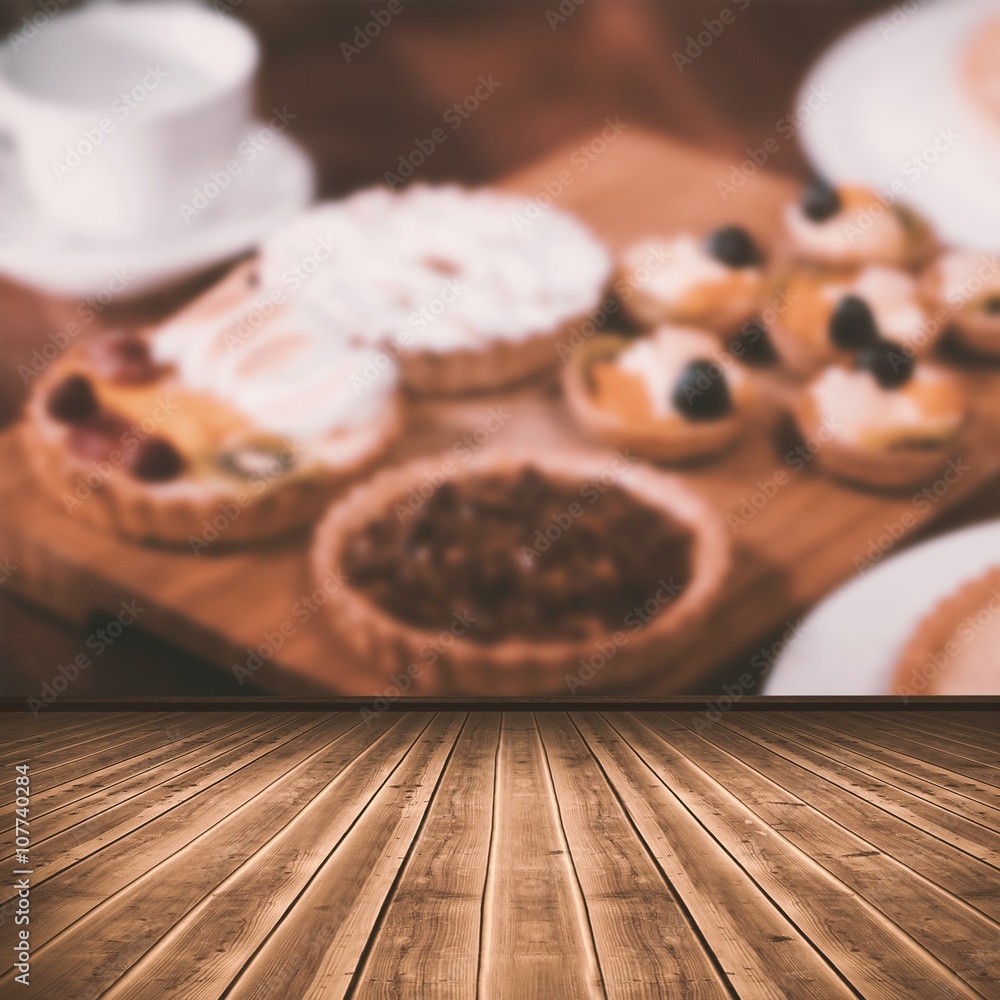 Composite image of high angle view of gray hardwood floor