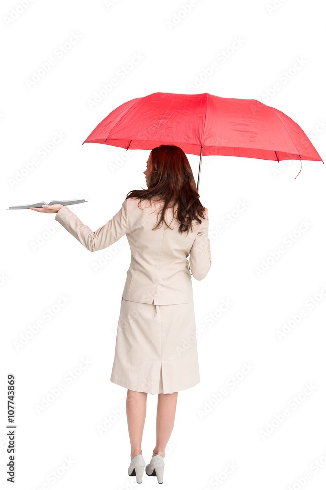 Businesswoman showing a book