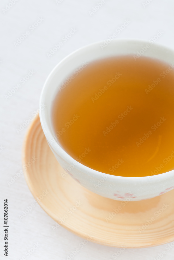 A Cup of Chinese hot tea on white table