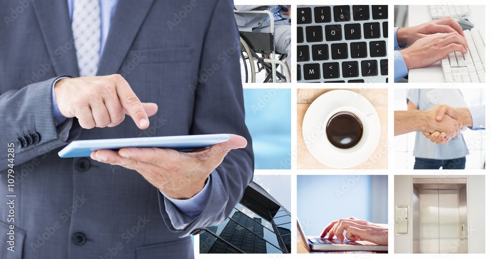 Composite image of businessman using tablet pc