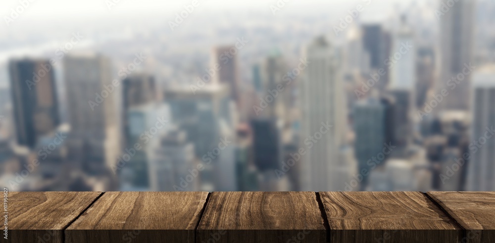 Composite image of wooden desk