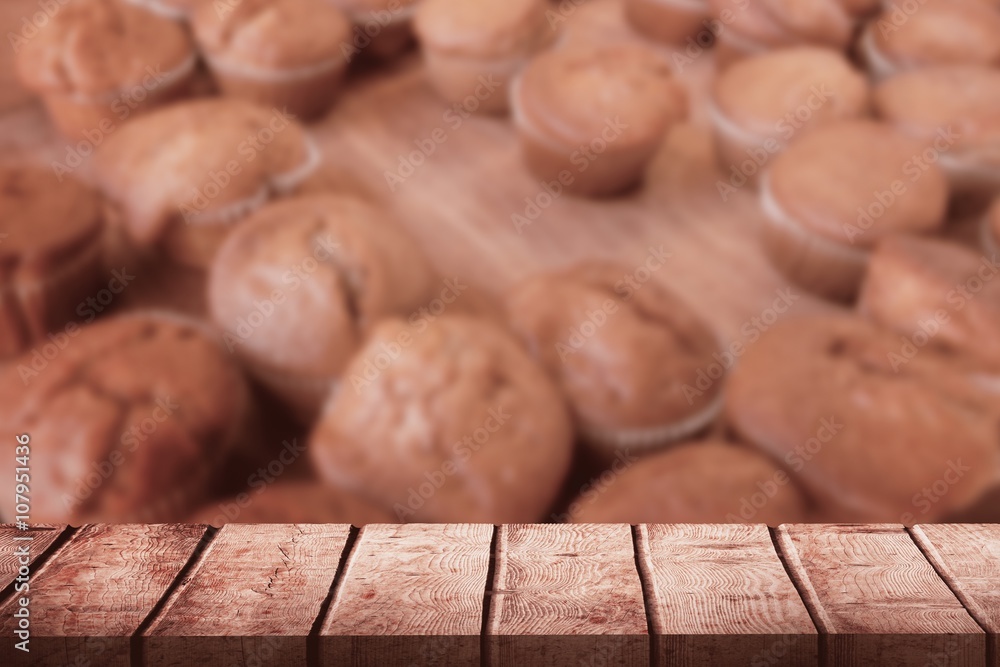 Composite image of wooden desk