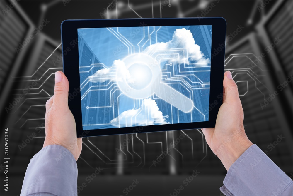 Composite image of cropped hand of man holding digital tablet