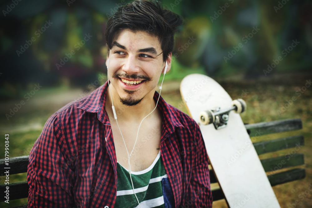 Skateboarding Sitting Relaxation Park Holiday Concept