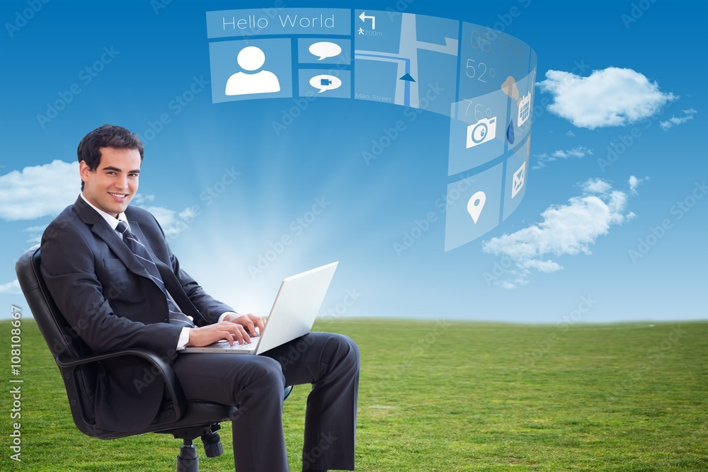 Composite image of young businessman sitting on an armchair