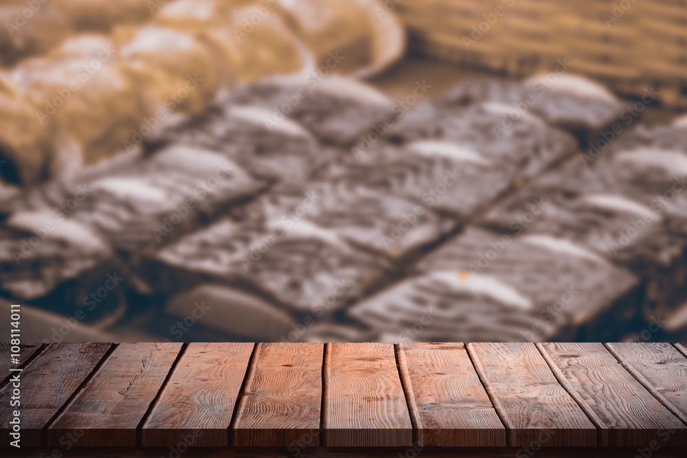 Composite image of wooden table