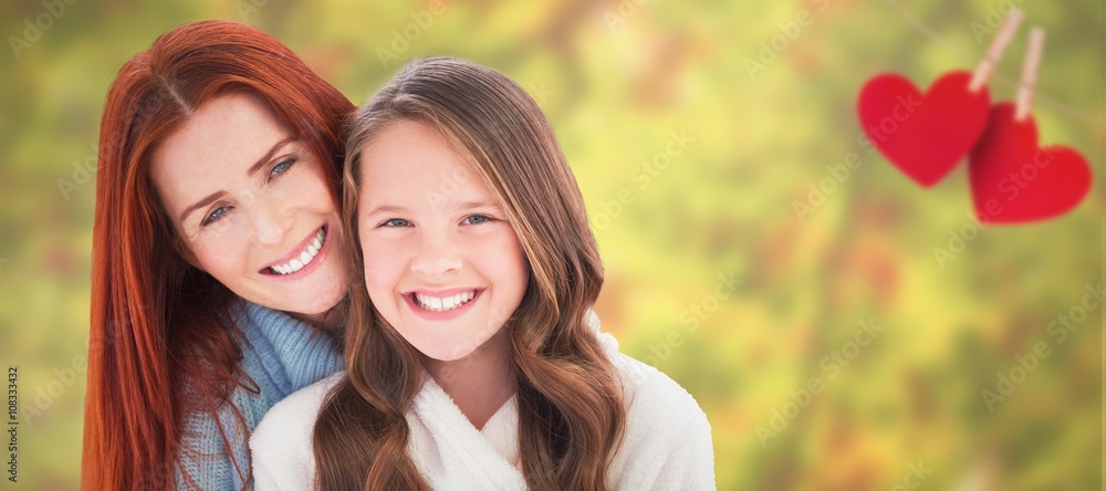 Composite image of portrait of happy mother with daughter