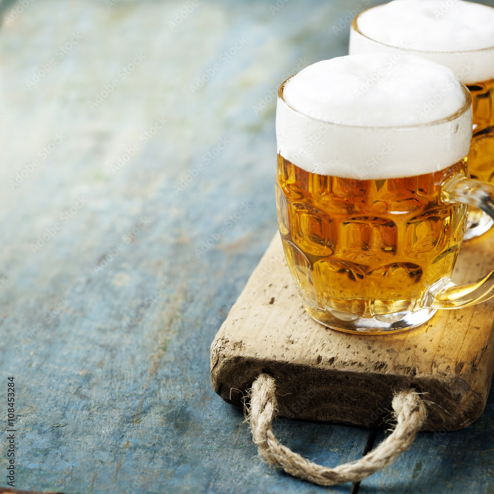  beer on wood background with copyspace