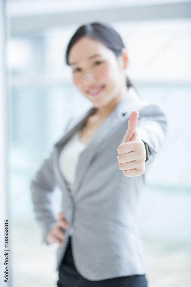 business woman show thumb up