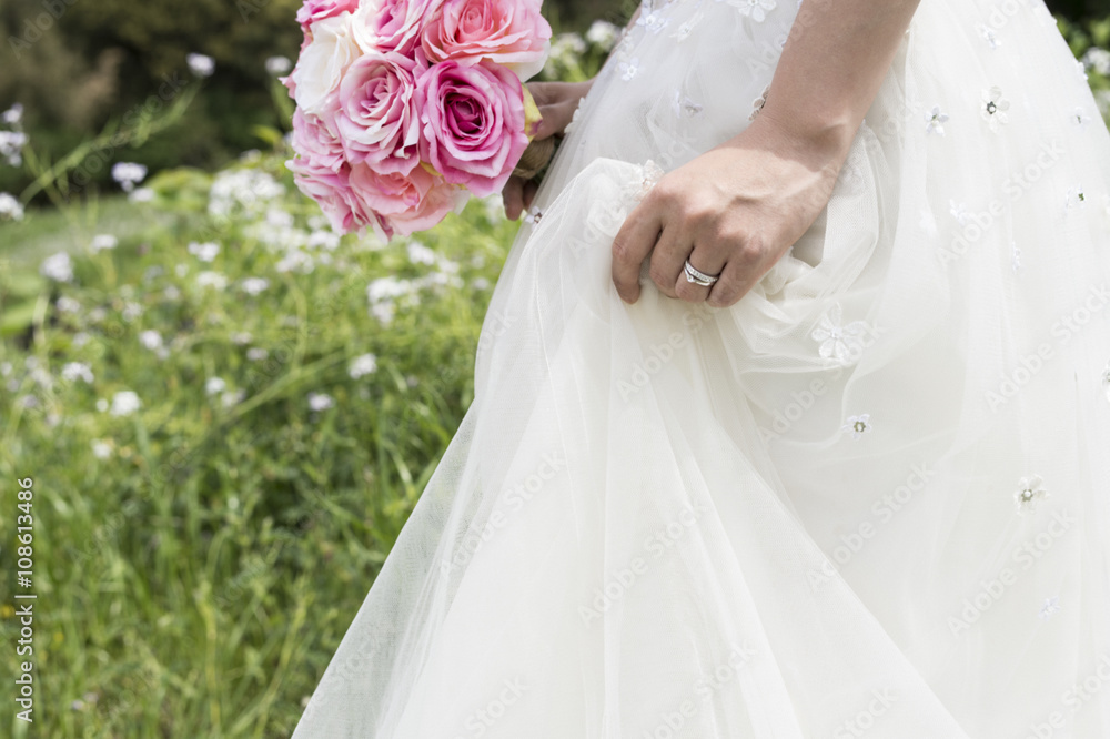 Beautiful bride you are taking wedding photos in the prairie