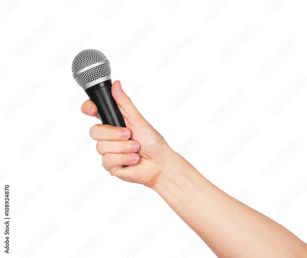 Male hand holding microphone on white background