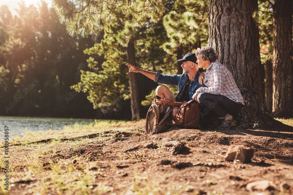 Senior man and woman on a hike in nature