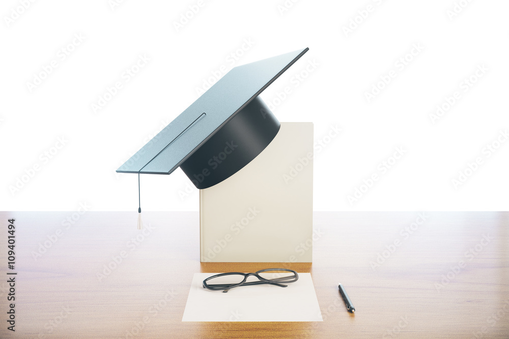 Graduation concept wooden desk