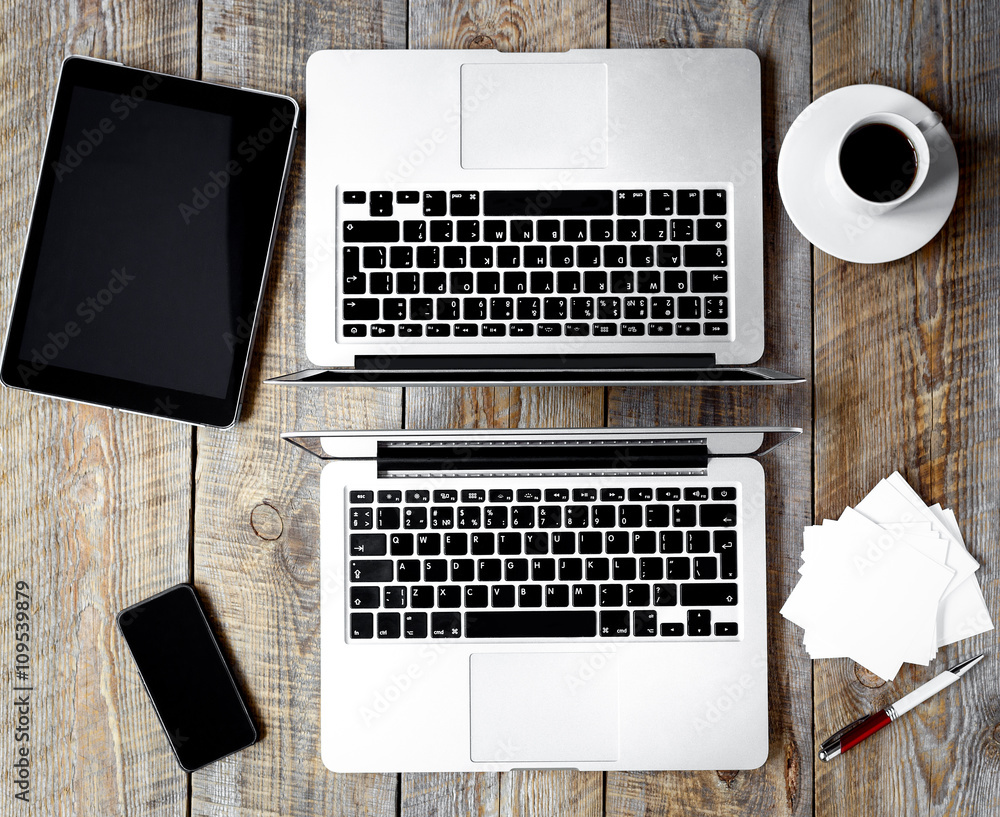 Comfortable working place at home with laptop on wooden table