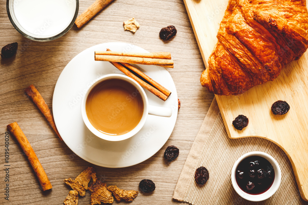 breakfast at home on wooden table with cup of  coffee