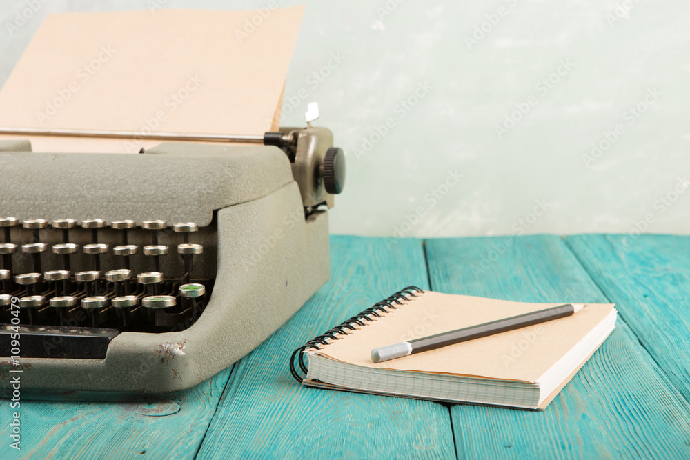 writers workplace - wooden desk with typewriter