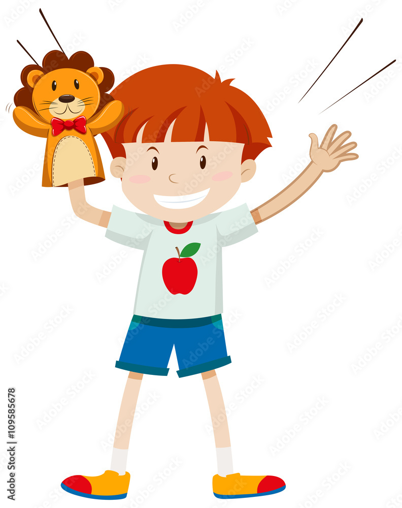 Boy playing with lion puppet