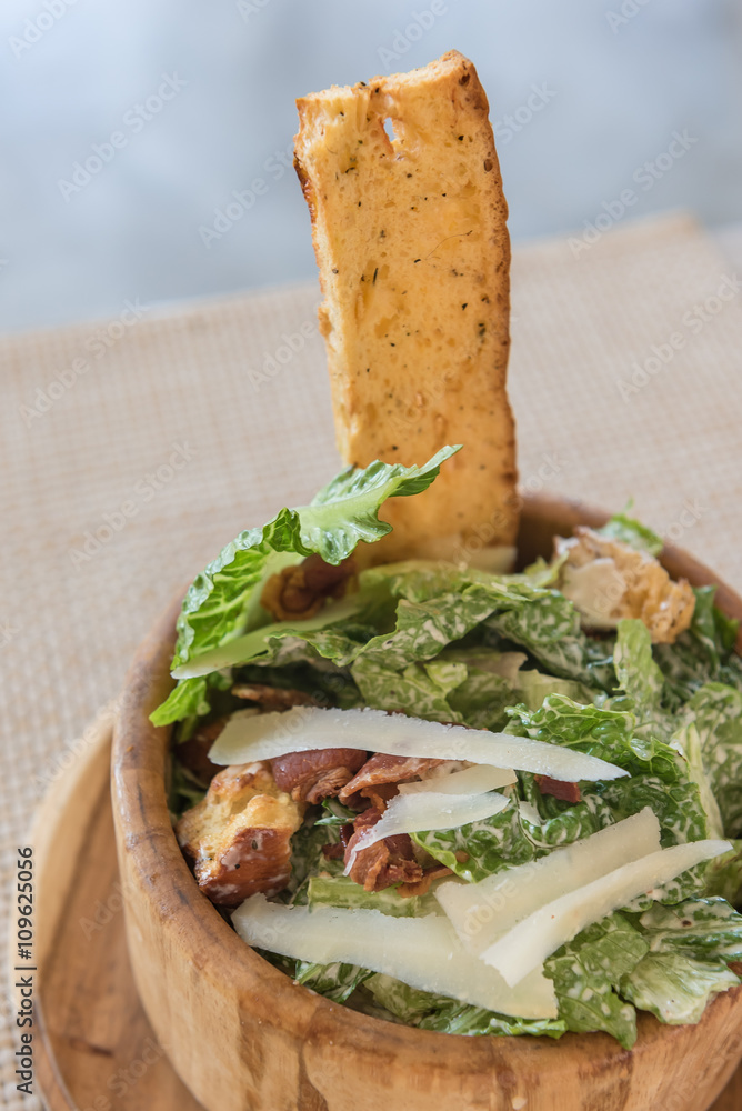 wooden bowl of salad with fresh vegetables