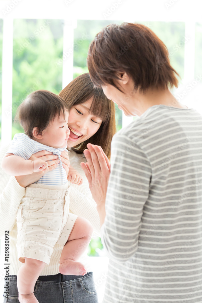 portrait of young asian family relaxing