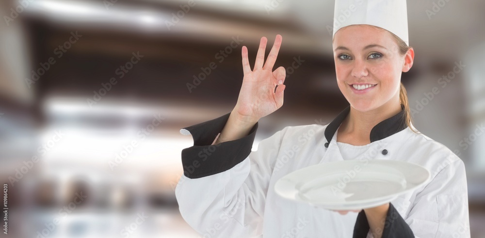 Composite image of portrait of a satisfying chef and holding an 