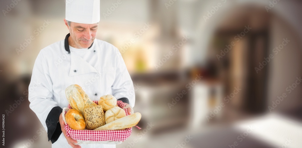 Composite image of friendly chef holding a bread basket 