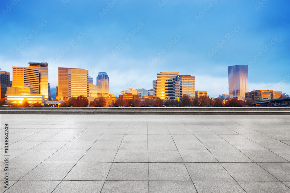 empty marble floor with cityscape and skyline of portland