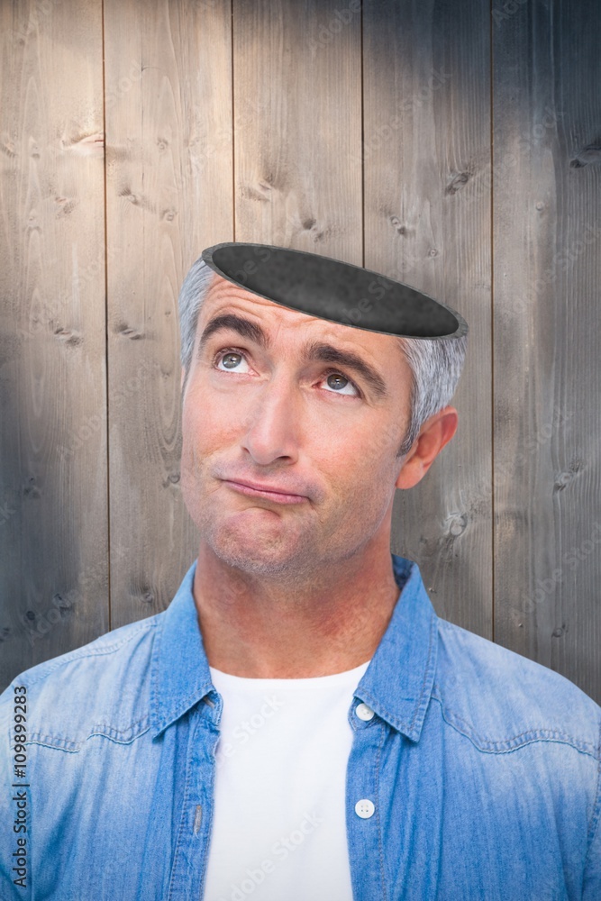 Composite image of confused man with grey hair thinking