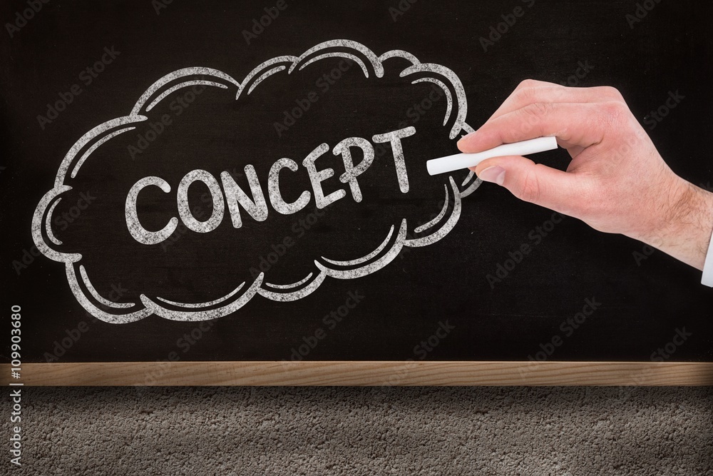 Composite image of businessman writing with white chalk 