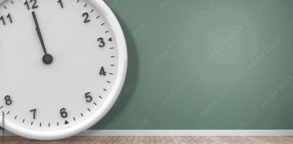 Composite image of clock at midnight