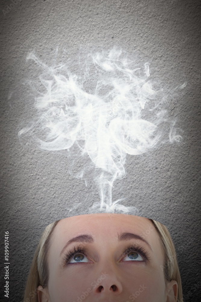 Composite image of close up of blonde woman looking up