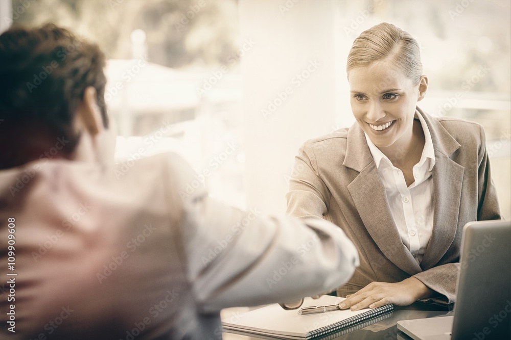 Manager interviewing a male applicant