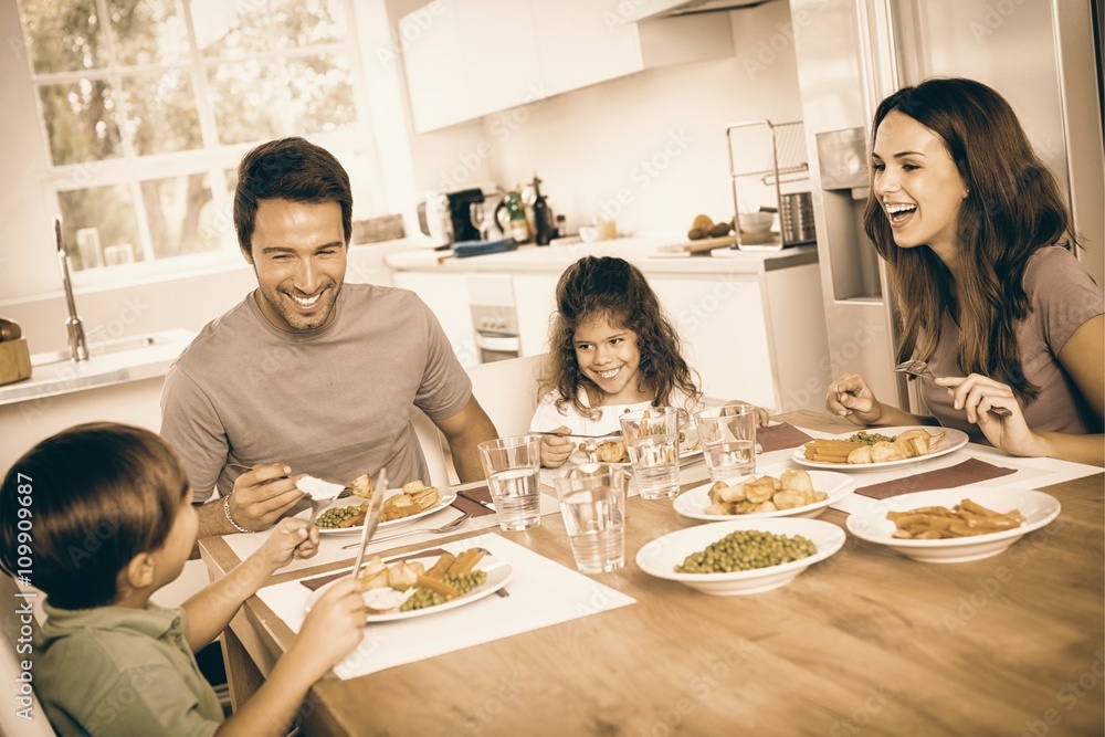 Family laughing around a good meal