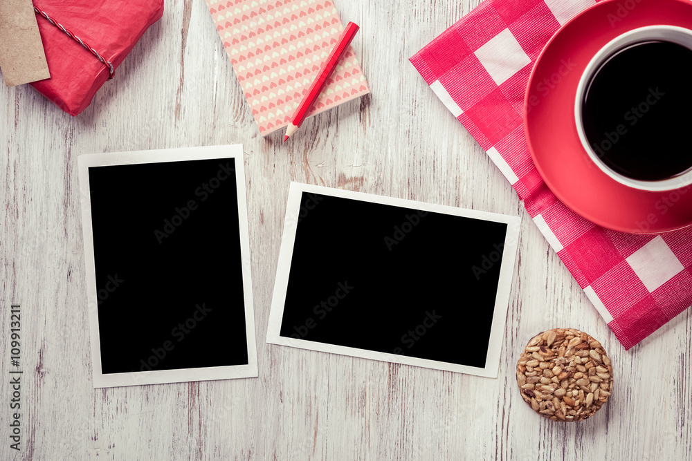 Blank photo frames on table