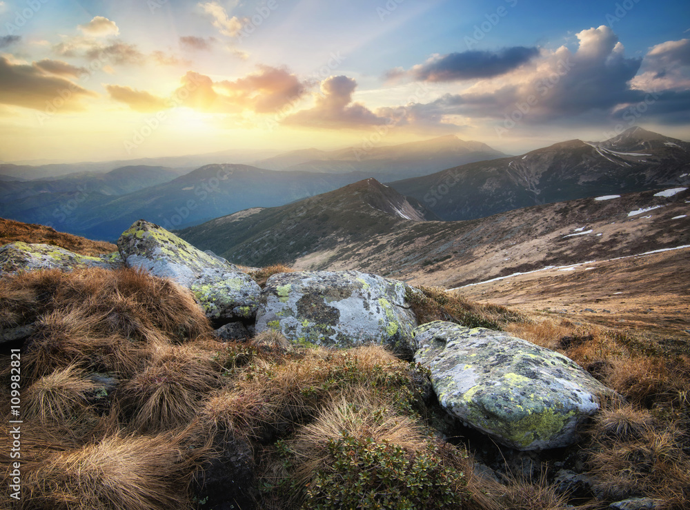 Rocks in the mountain valley during sunrise. Beautiful natural landscape in the spring time