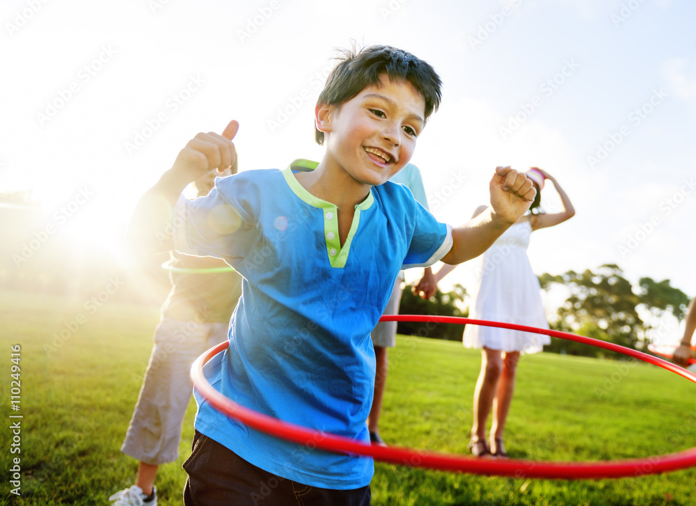 Whole Family Hula Hooping Outdoors Togetherness Concept